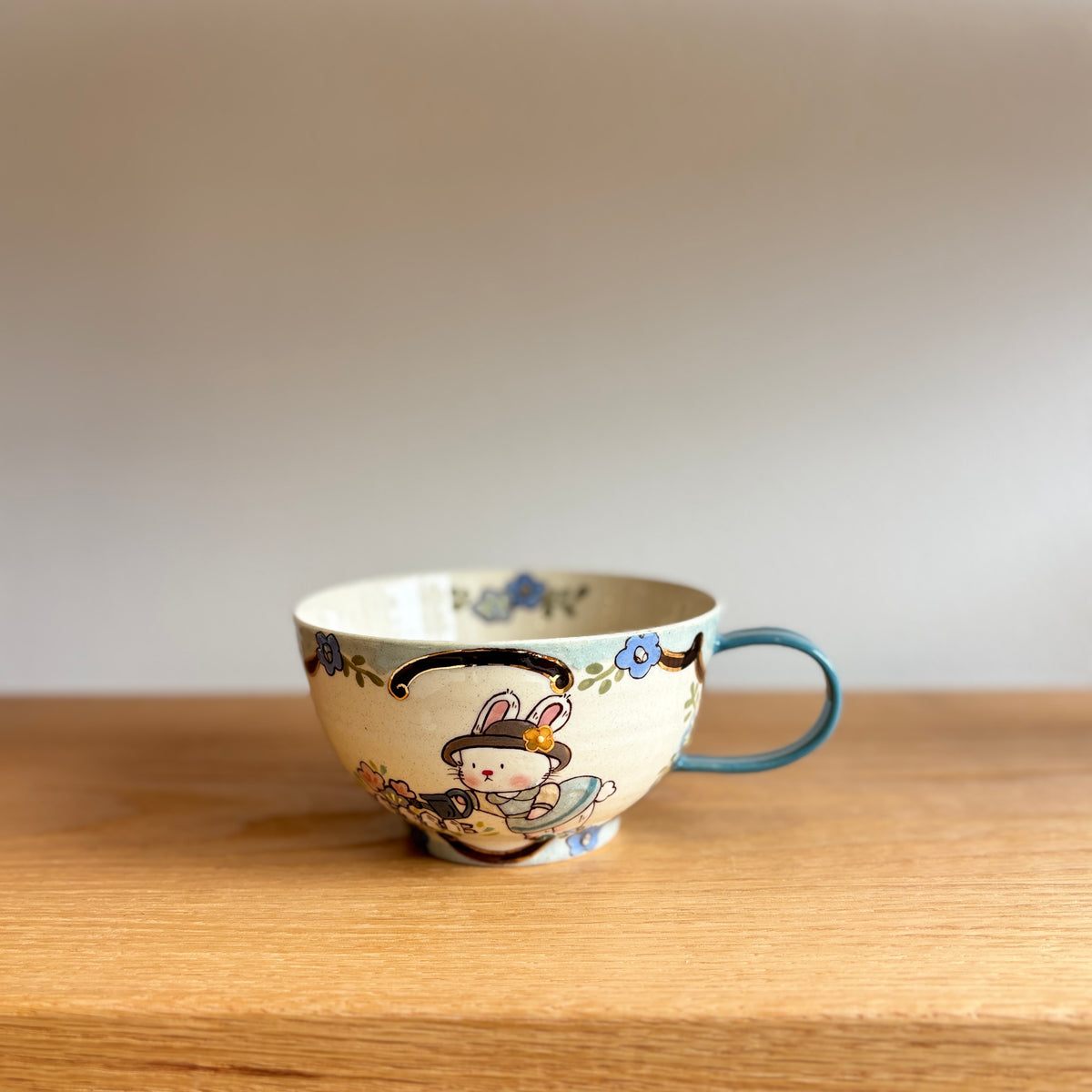 Blue Bunny Handle Egg Cup & Saucer Set