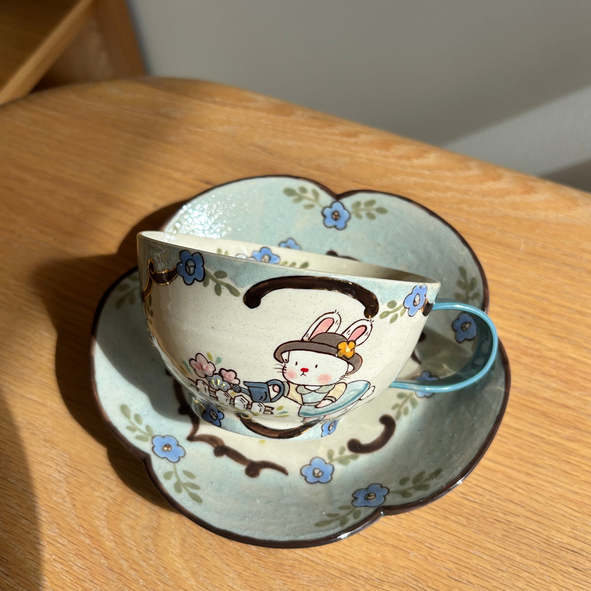 Blue Bunny Handle Egg Cup & Saucer Set