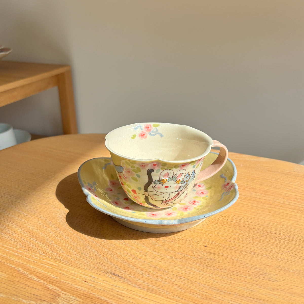 Yellow Cupid Bunny Cup & Saucer Set